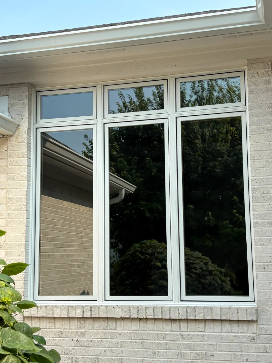 Storm-damaged window documented in Hickory Ridge Village